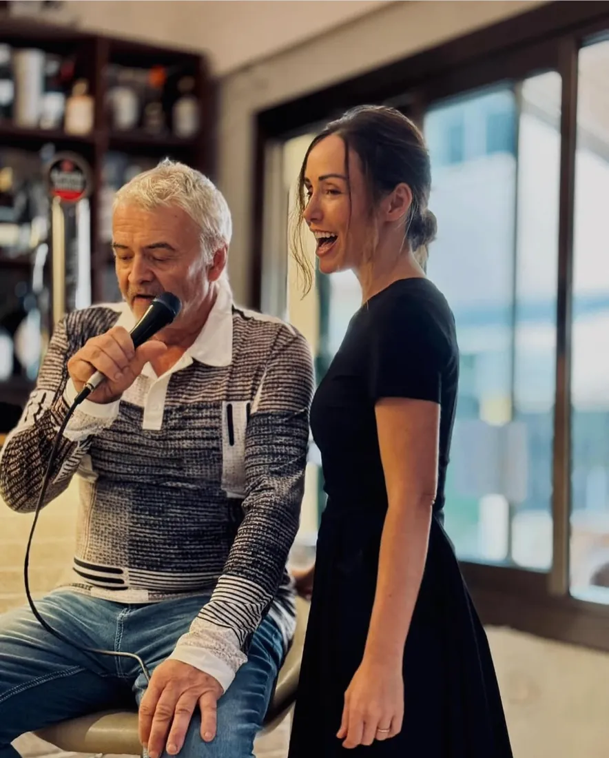 Christian singing into the microphone on a Sunday at Viva